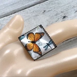 Adjustable bronze monarch butterfly glass ring